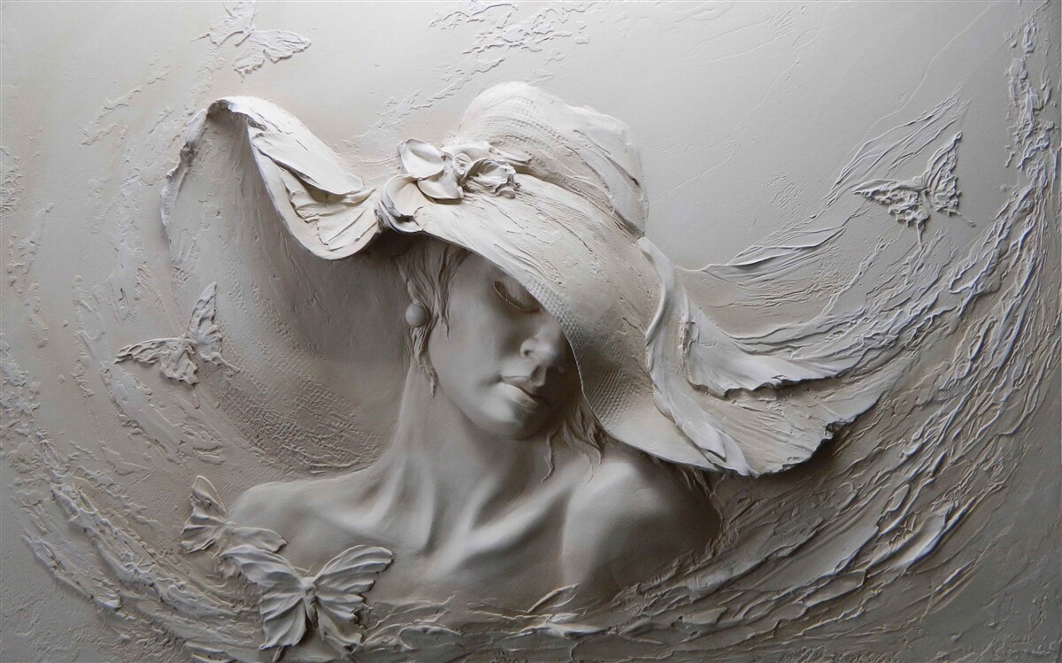 Fototapet pe perete o imagine sculptată a unei fete cu pălărie