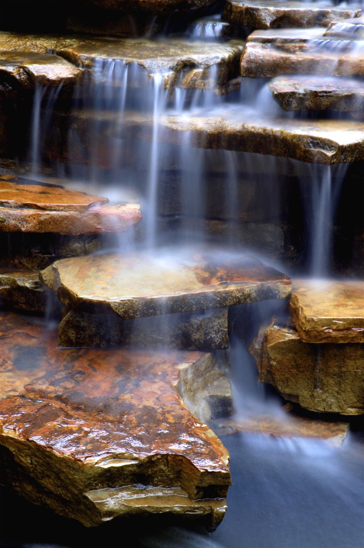 Fototapet lanț de cascade cu rafturi de piatră